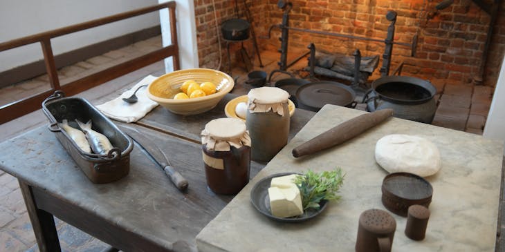 Ingredients and utensils resting on a 1700s table in Virginia.