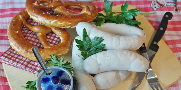 Weisswurst and pretzel at German restaurant.