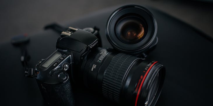 Canon camera and lens on a black background