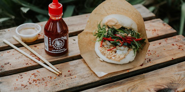 Gua bao and hot sauce from an Asian fusion restaurant