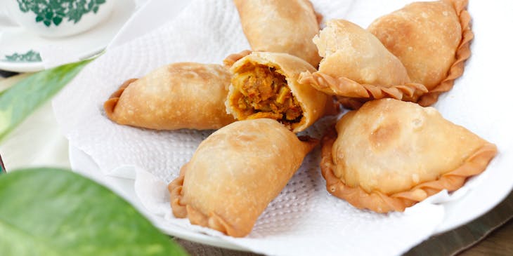 Puerto Rican empanadas plated and served in a Puerto Rican restaurant.