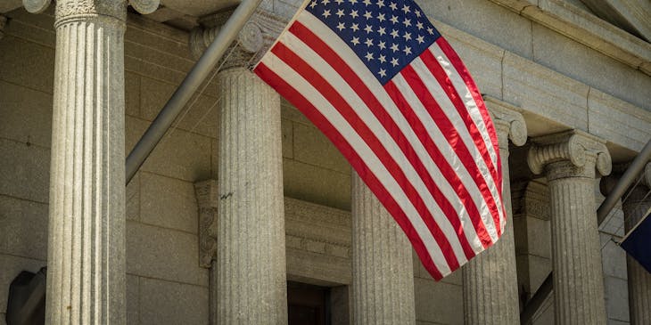 Close-up of American flag at a courthouse.