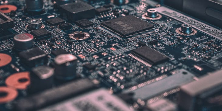 Close-up of a circuit board at a tech business.